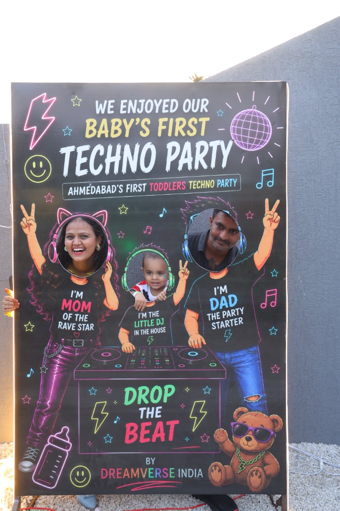 Family posing at the photo booth
