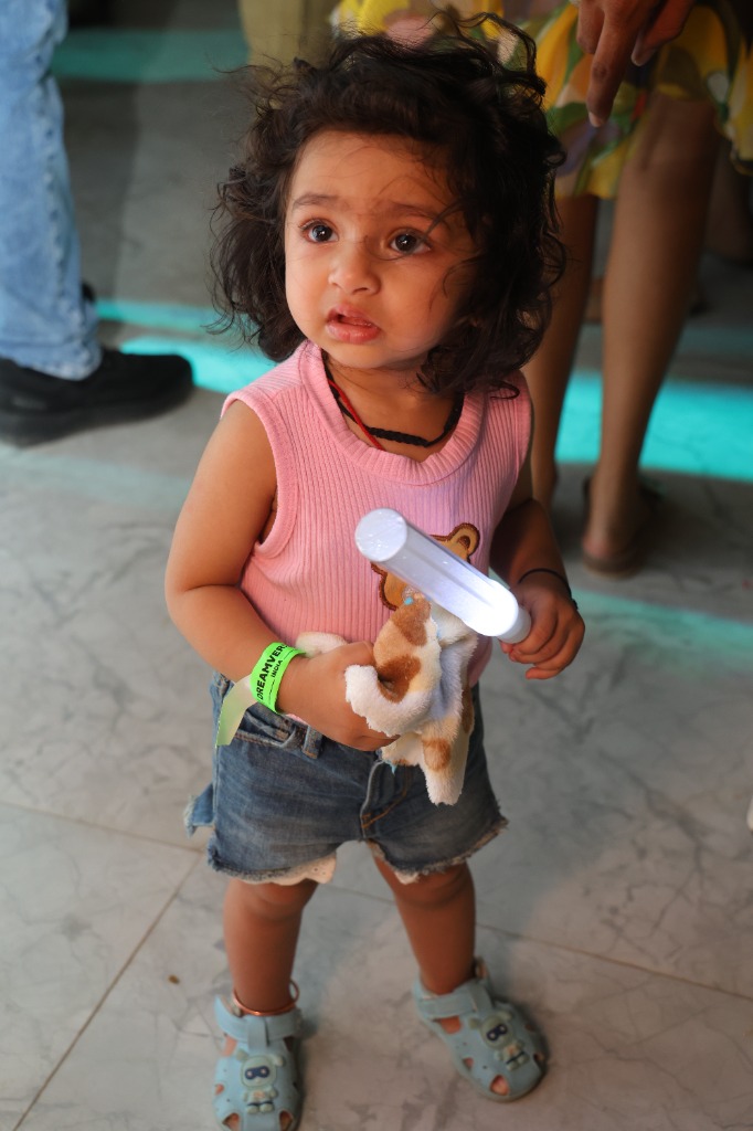 Child holding glow stick